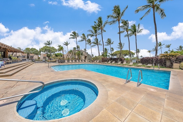 view of swimming pool featuring a patio