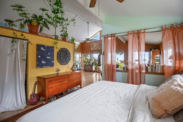 bedroom with ceiling fan and lofted ceiling