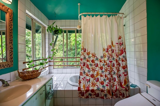 full bathroom with toilet, shower / bathtub combination with curtain, and vanity