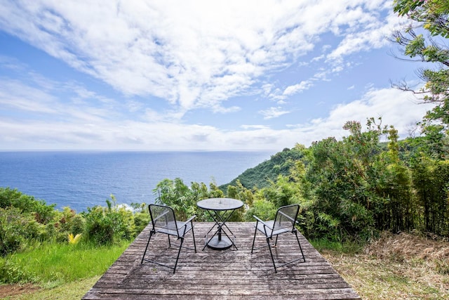 deck featuring a water view