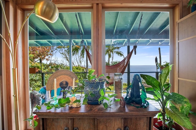 interior space featuring a water view and a wealth of natural light