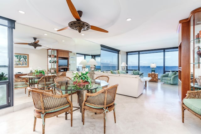 dining space with floor to ceiling windows