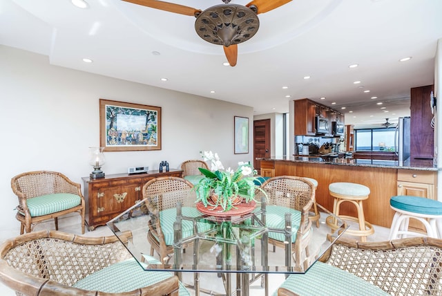 dining room with ceiling fan