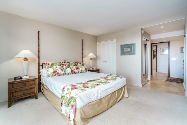 carpeted bedroom featuring a closet