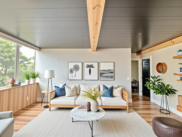 111 Kahului Beach Rd Unit D-321, Kahului, HI 96732 - living room with light wood-style flooring, baseboards, and beamed ceiling