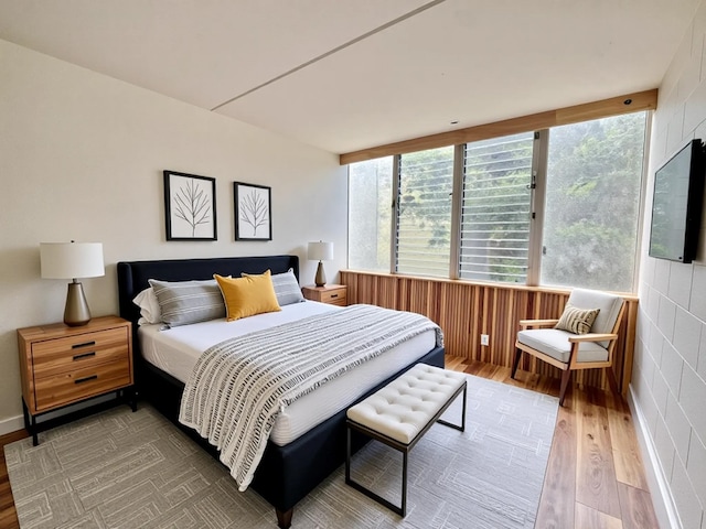 111 Kahului Beach Rd Unit D-321, Kahului, HI 96732 - bedroom featuring wood finished floors and multiple windows