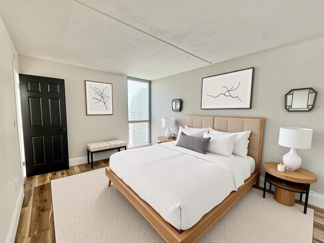 111 Kahului Beach Rd Unit D-321, Kahului, HI 96732 - bedroom with baseboards and wood finished floors