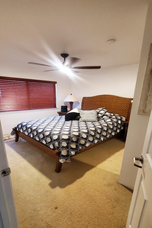 bedroom featuring carpet floors and ceiling fan