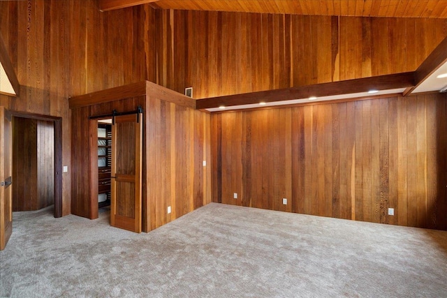 2450 Piiholo Rd, Makawao, HI 96768 - carpeted spare room featuring wooden walls and wooden ceiling