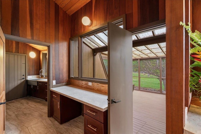 2450 Piiholo Rd, Makawao, HI 96768 - bathroom featuring wooden walls, vanity, and lofted ceiling