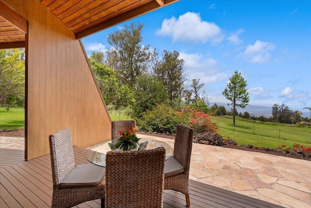 2450 Piiholo Rd, Makawao, HI 96768 - wooden terrace featuring a patio area and a lawn