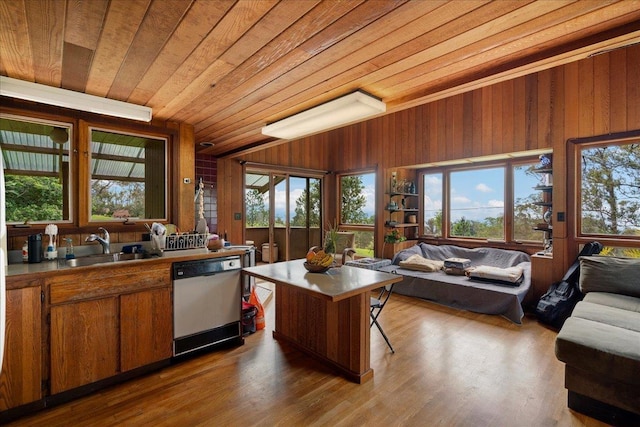 2450 Piiholo Rd, Makawao, HI 96768 - kitchen featuring dishwashing machine, wood ceiling, brown cabinetry, open floor plan, and a sink