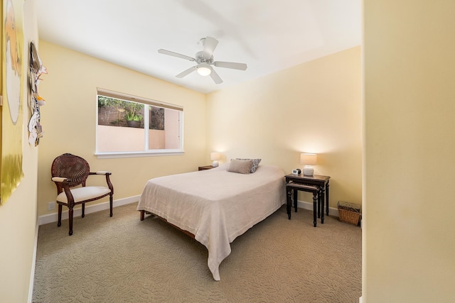 bedroom with light carpet and ceiling fan