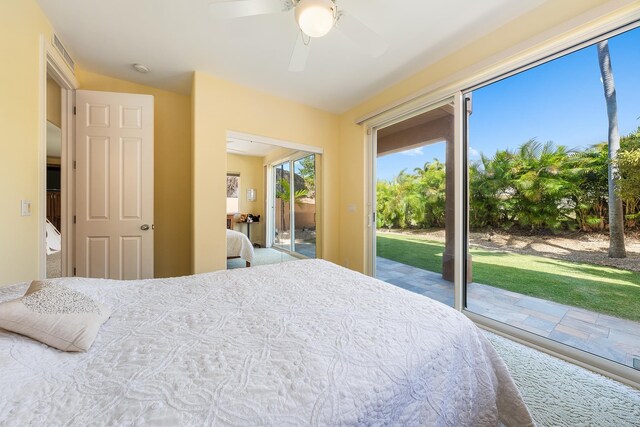 bedroom with ceiling fan, access to outside, and carpet