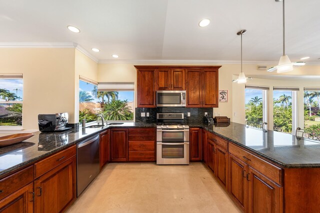 kitchen featuring kitchen peninsula, stainless steel appliances, light tile patterned floors, and a wealth of natural light