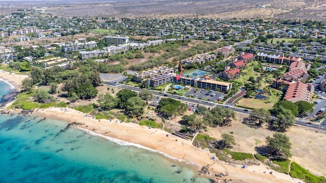 aerial view featuring a view of the beach and a water view