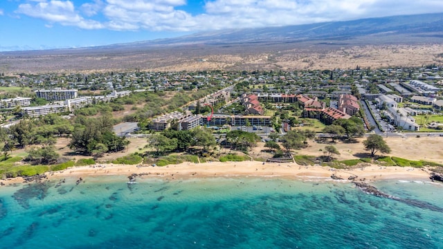 aerial view with a view of the beach and a water view