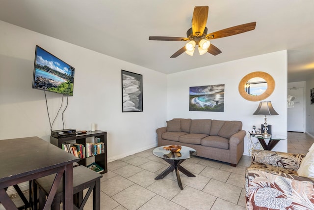 living room with ceiling fan and light tile patterned flooring