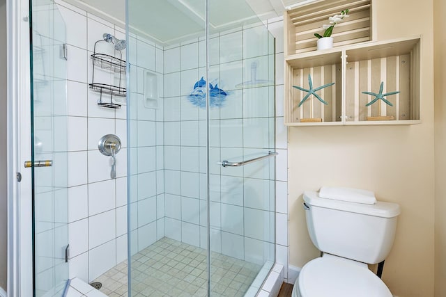 bathroom featuring walk in shower and toilet