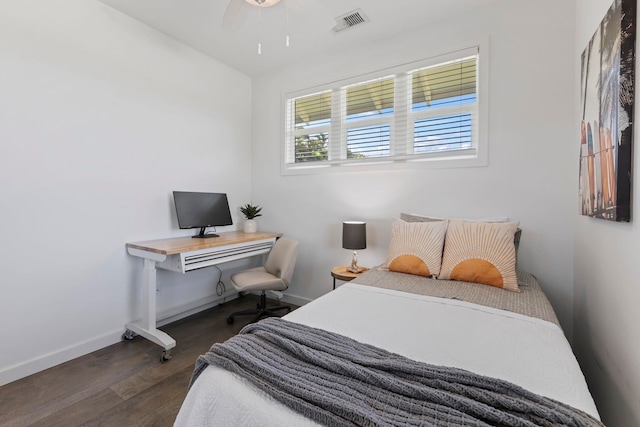 bedroom featuring dark hardwood / wood-style floors