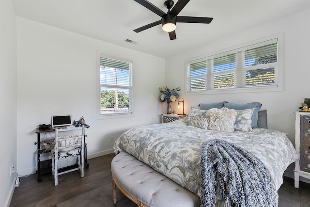 bedroom featuring dark wood-type flooring and ceiling fan