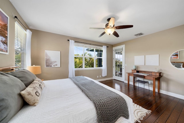 206 Kuli Puu St, Kihei, HI 96753 - bedroom with wood-type flooring, access to exterior, multiple windows, and baseboards