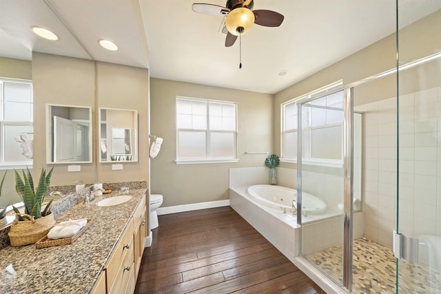 206 Kuli Puu St, Kihei, HI 96753 - full bathroom with baseboards, a bath, toilet, vanity, and a stall shower
