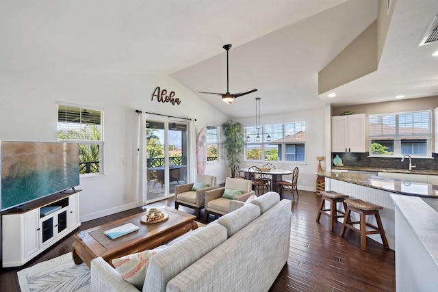 206 Kuli Puu St, Kihei, HI 96753 - living area with healthy amount of natural light, baseboards, dark wood-style flooring, high vaulted ceiling, and recessed lighting