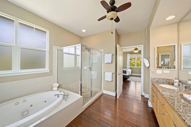 206 Kuli Puu St, Kihei, HI 96753 - full bath featuring a ceiling fan, a stall shower, a whirlpool tub, vanity, and hardwood / wood-style flooring