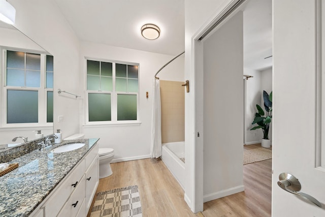 206 Kuli Puu St, Kihei, HI 96753 - bathroom featuring wood finished floors, vanity, toilet, baseboards, and shower / bath combo