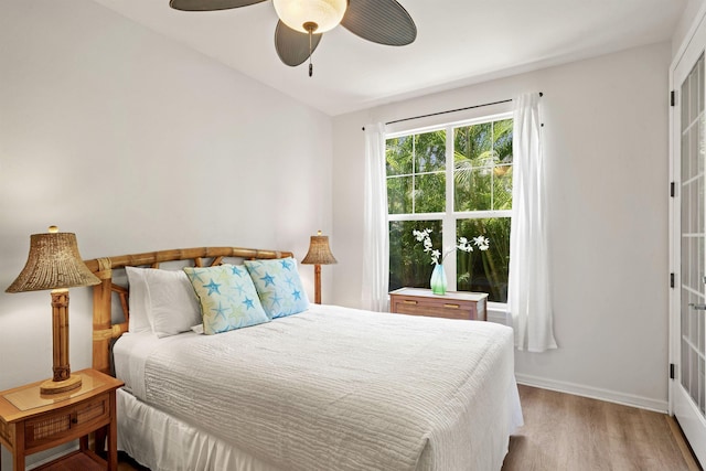 206 Kuli Puu St, Kihei, HI 96753 - bedroom with wood finished floors, baseboards, and a ceiling fan