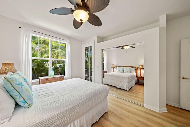 206 Kuli Puu St, Kihei, HI 96753 - bedroom featuring light wood-type flooring, access to exterior, ceiling fan, and baseboards