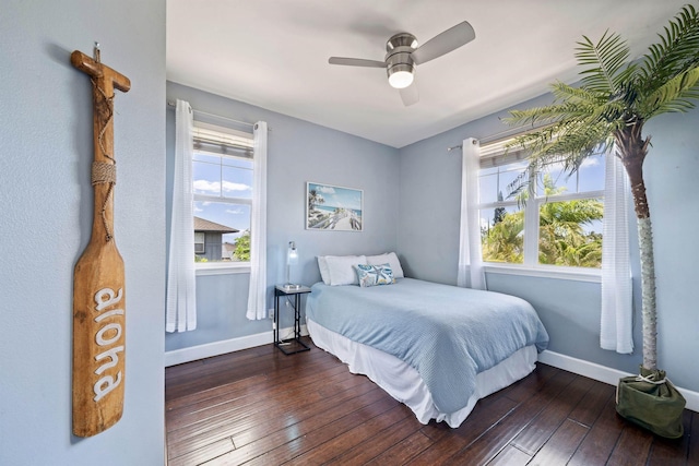 206 Kuli Puu St, Kihei, HI 96753 - bedroom with baseboards, hardwood / wood-style floors, and a ceiling fan