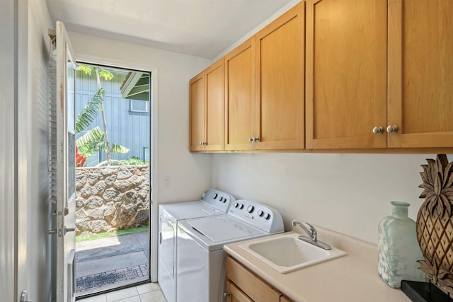 206 Kuli Puu St, Kihei, HI 96753 - laundry room with cabinet space, washing machine and clothes dryer, and light tile patterned floors