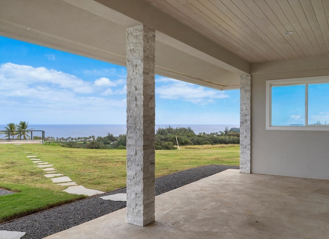 view of patio / terrace featuring a water view