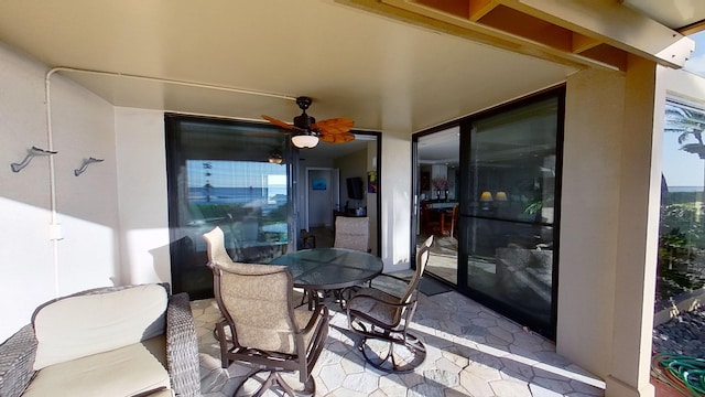 view of patio with ceiling fan