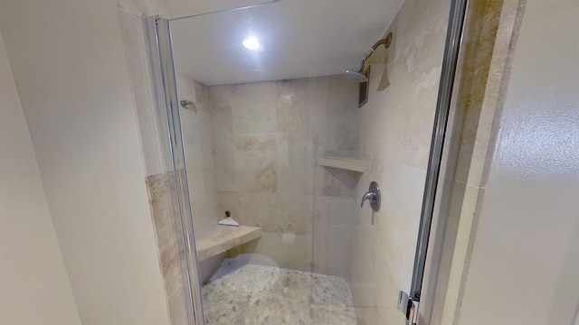 bathroom featuring an enclosed shower