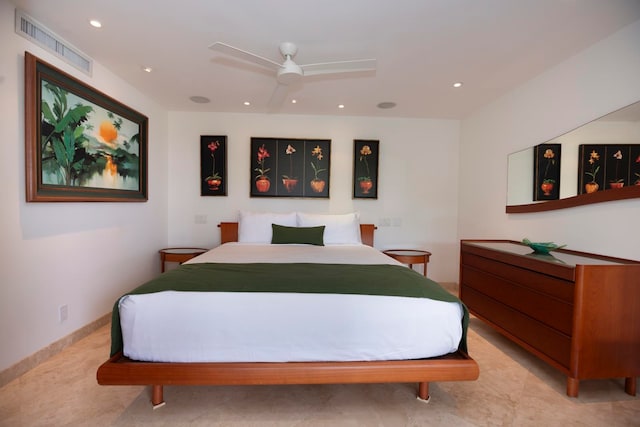 tiled bedroom with ceiling fan