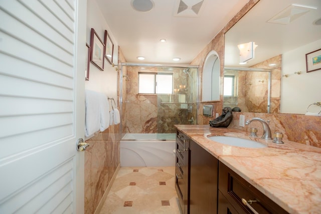 bathroom with tile floors and vanity