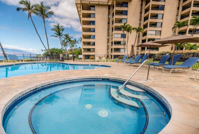 view of swimming pool featuring a patio