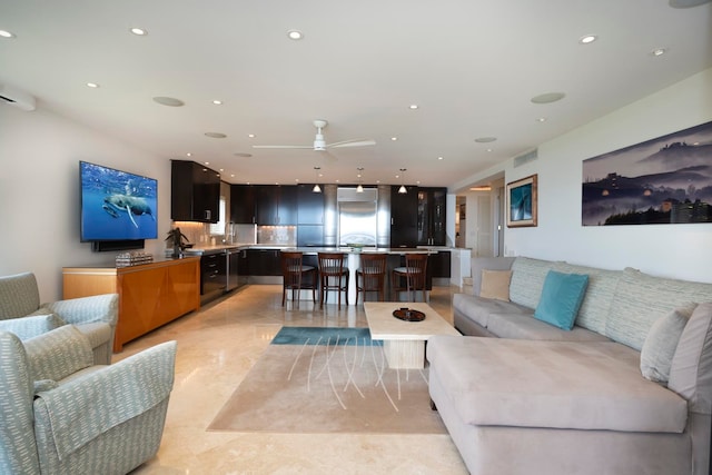 living room with ceiling fan