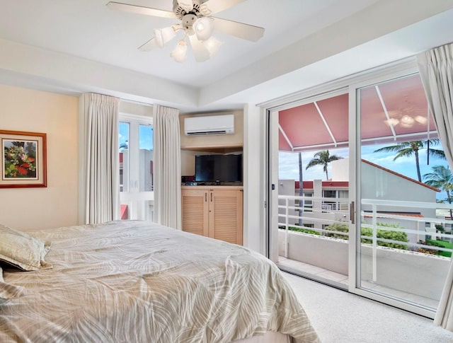 carpeted bedroom featuring ceiling fan, a wall unit AC, and access to exterior