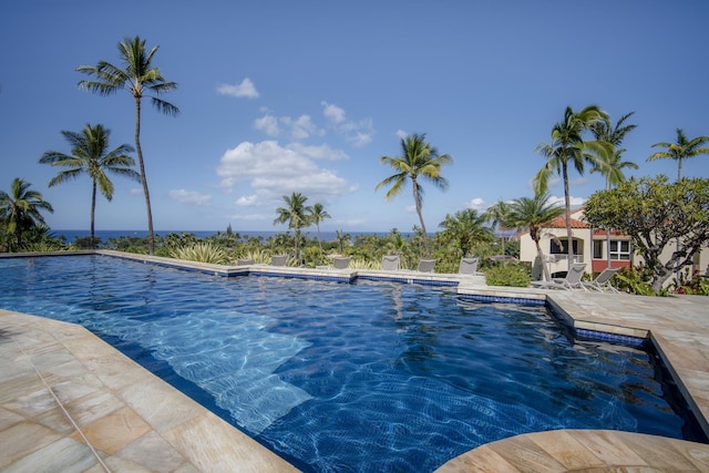 outdoor pool featuring a patio area