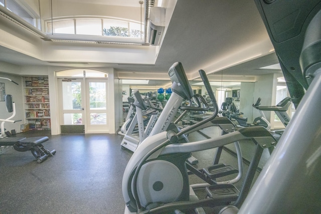 gym featuring french doors