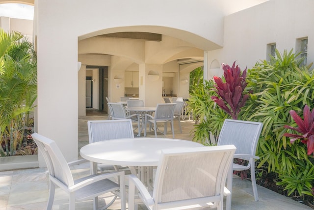 view of patio featuring outdoor dining space