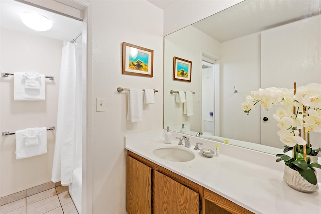 full bathroom featuring shower / bath combo with shower curtain, toilet, tile patterned floors, and vanity