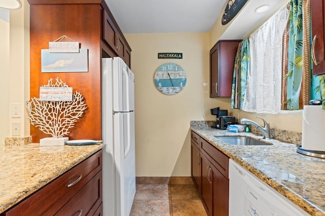 280 Hauoli Rd Unit A16, Wailuku, HI 96793 - kitchen with white appliances, a sink, light stone countertops, baseboards, and light tile patterned floors