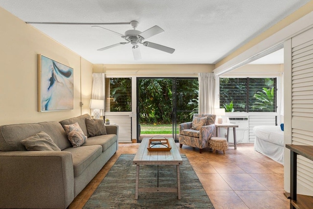 280 Hauoli Rd Unit A16, Wailuku, HI 96793 - tiled living area with healthy amount of natural light and a ceiling fan