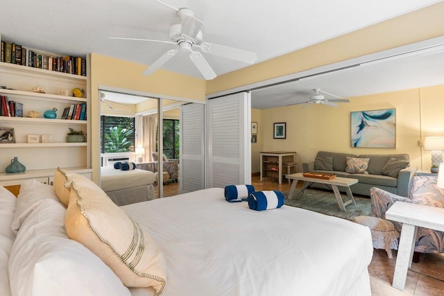 tiled bedroom with ceiling fan