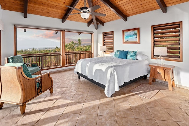 tiled bedroom featuring wood ceiling, ceiling fan, and beam ceiling